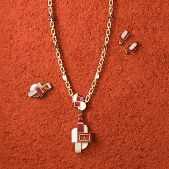 sautoir watch set with diamonds and precious stones