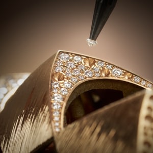 Setting diamonds on a rose gold diamond bracelet