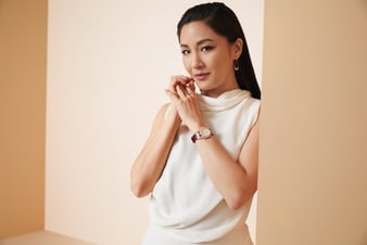 Constance Wu sparkling with luxury jewelry and a rose gold diamond watch