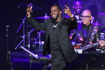 P. Diddy wearing a Piaget white gold diamond watch at the 2020 Grammy Awards