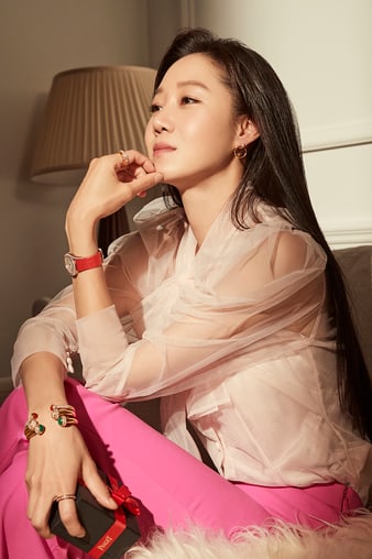 Kong Hyo-Jin wears Piaget gold bangle bracelets and rose gold watch