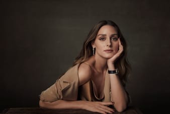 Olivia Palermo stunning with a gold diamond watch and diamond earrings