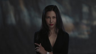 Chen Man looks stunning with a white gold diamond pendant and a diamond watch