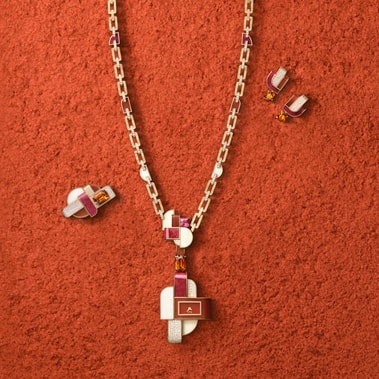 sautoir watch set with diamonds and precious stones