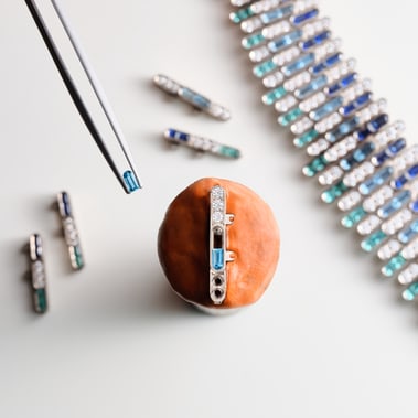 necklace featuring an assembly of sapphire and precious gemstones
