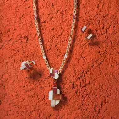 sautoir watch set with diamonds and precious stones